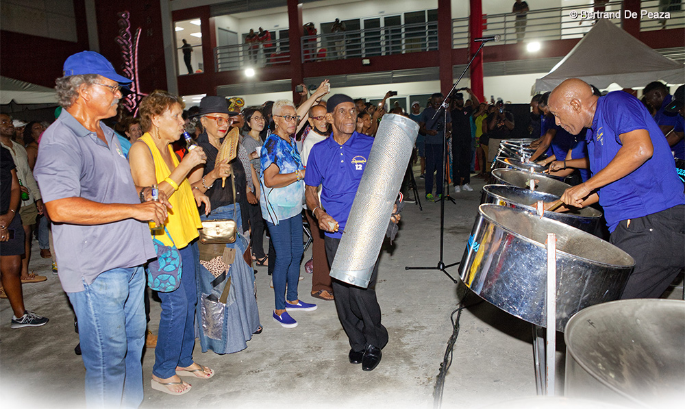 Host Steel band Desperadoes entertaining a grateful crowd.